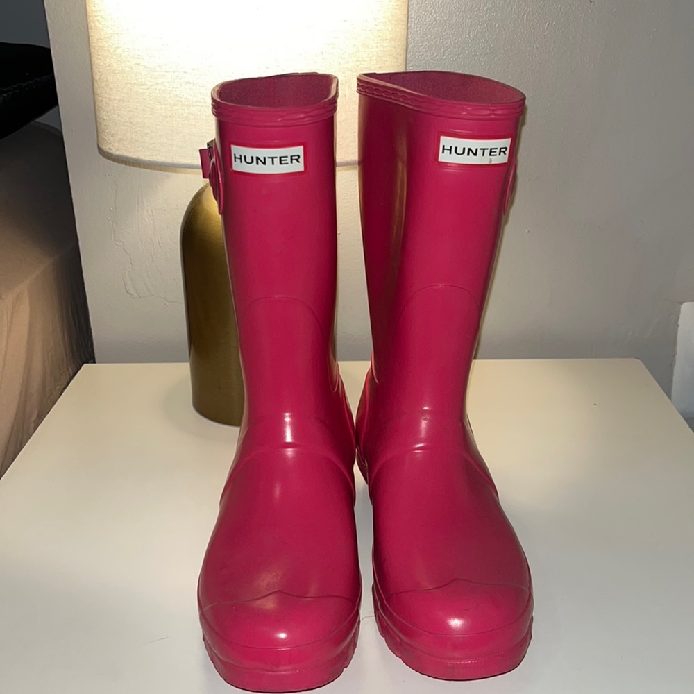 Gently used Hunter rainboots. Pink, calf height, size 8 women’s.